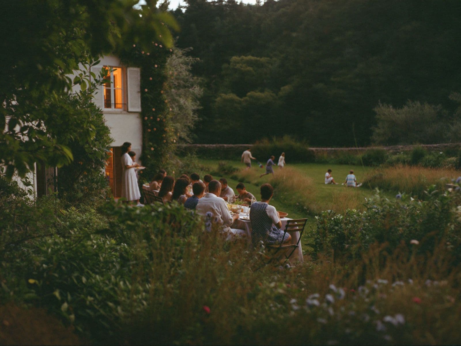 Family gathered on the terrace of a weekend house